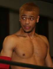 Record-setting three-time and most combined days as MLW World Middleweight champion at 814, Myron Reed. MyronReed2019Cropped.png