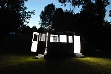 The mobile exhibition space of the No Show Museum. Mansbach, 2015 No Show Museum at night.jpg