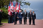 Obama, Pangeran Charles, Coklat, Harper & Sarkozy di Normandia American Cemetery and Memorial 2009-06-06.JPG