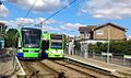 Old (Bombardier Flexity Swift) and new (Stadler Variobahn) trams at Dundonald road stop.