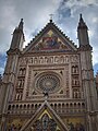 Top gable and rose window