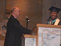 Philadelphia Mennonite High School Graduation, 2009. Fairmount Civic Assocation board member David Thomsen presenting the Association's award to Gregory McFarland.