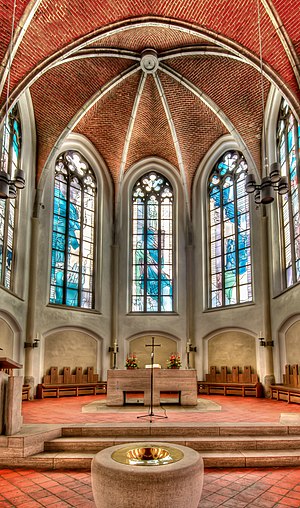 Sanctuary of the "Petri-Kirche" in Mülheim an der Ruhr with enlightned windows
