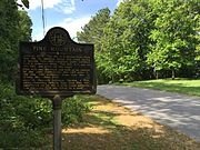 Color photo shows an historical marker on Pine Mountain.