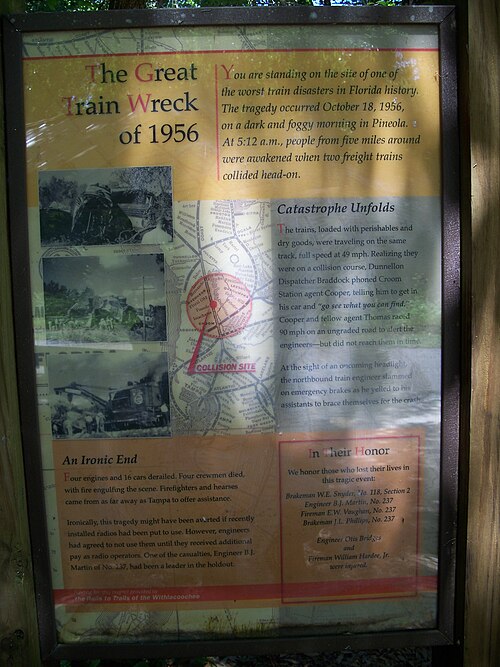 Withlacoochee State Trail signpost commemorating the Great Train Wreck of 1956 in Pineola