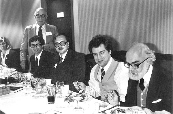 1983 CSICOP Conference in Buffalo, NY. Note: Randi's fork is bent. With Pip Smith, Klass (standing), Dick Smith, Robert Sheaffer, John Merrell, and Ja