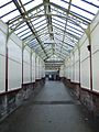 Covered walkway leading from the main station entrance on Princes Street to the concourse and ticket office