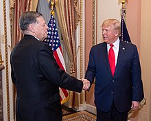 Cole shaking hands with President Donald Trump in February 2020 President Donald Trump shaking hands with Congressman Tom Cole.jpg