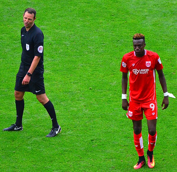 Abraham (right) playing for Bristol City in 2016