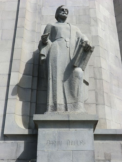 Statue of Toros Roslin in front of the entrance of the Matenadaran