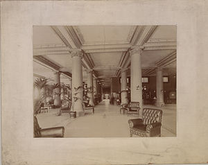 Black and white postcard of the hote's rotunda