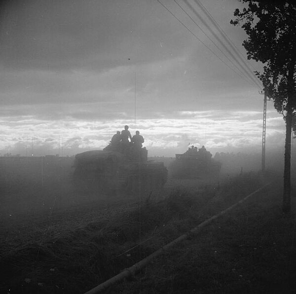 Cromwell tanks of the 7th Armoured Division move up in the morning of 30 July 1944