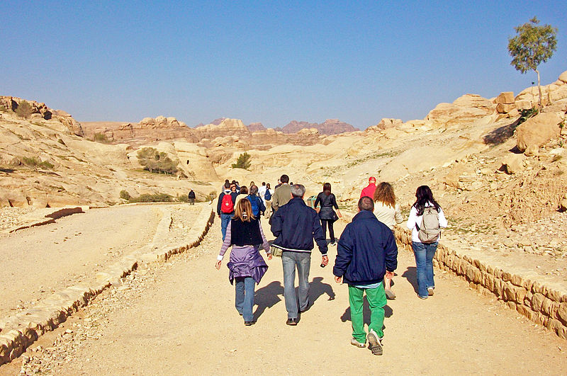 File:Tourists on the road to the Siiq at Petra, Jordan.jpg