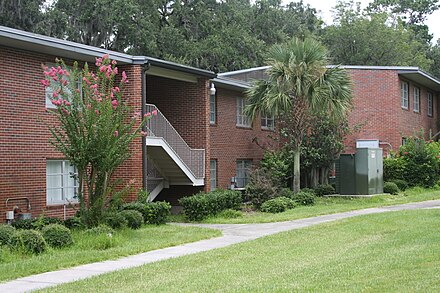 Building 271 is the only building that remains from Schuct Village. It is currently used by Shands to house transplant patients UF Shands Schucht271.jpg