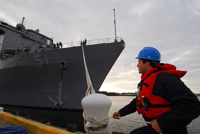 File:US Navy 070104-N-8704K-005 Boatswain's Mate Seaman Ruben Casilla prepares to release the mooring lines as amphibious dock landing ship USS Oak Hill (LSD 51) departs from Naval Amphibious Base (NAB) Little Creek.jpg