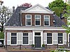 Huis van het Asser type met fronton