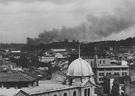 View of Singapore with smoke in early 1942.jpg