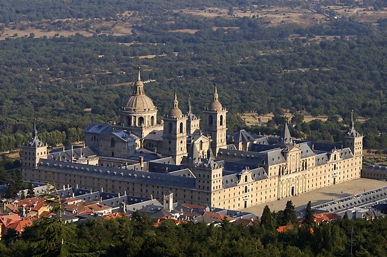 San Lorenzo de El Escorial, construction started in 1559 – located 45 km (28 mi) northwest of Madrid.