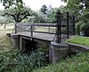 Plantagehuis: brug met toegangshek