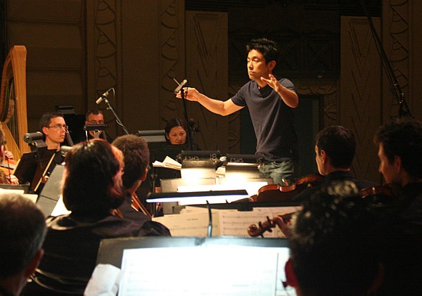 Hokoyama conducting in 2009