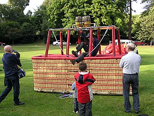 A wicker balloon basket capable of holding 16 passengers