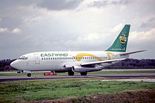 10ai - Eastwind Airlines Boeing 737-2H5;  N221US @ TPA; 27.01.1998 (4786180859) .jpg