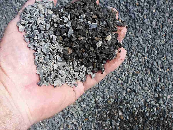 10 mm graded crushed basalt rock or aggregate, for use in concrete, called "blue metal" in Australia.