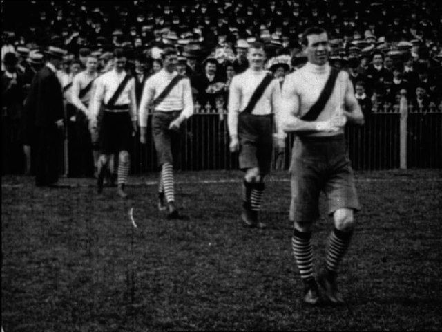 South Melbourne players enter the field before the 1909 grand final.