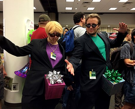 Two people wearing the costume from "Dick in a Box" at the Dragon Con 2014