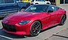 2023 Nissan Z Performance 6MT in Passion Red TriCoat, Front Left, 05-17-2023.jpg