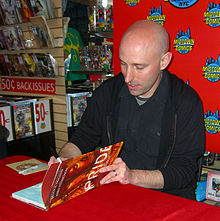 Writer Brian K. Vaughan signing a copy of the book at Midtown Comics in Manhattan. 3.15.12BrianKVaughanByLuigiNovi33.jpg