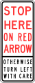 Pysähdy tässä punaisella nuolella tai käänny vasemmalle varovaisesti (Käytetään Uudessa Etelä-Walesissa)