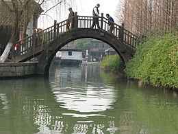 The bridge is designed to evoke the full moon. These bridges look especially beautiful on a full moon, when the moon is reflected in the water underneath the bridge.