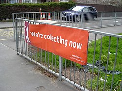 A Sainsbury's Active Kids banner outside a school. Tokens are collected at supermarkets and are redeemed for sports equipment. Active Kids.JPG