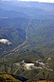 Aerial - looking along power lines NE of Mt. Rainier 01 - white balanced (9795126526).jpg