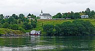 Lygra Kirke sett fra sjøen