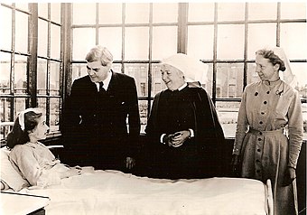 Bevan talking to a patient at Park Hospital, Manchester, the day the NHS came into being.