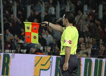 An assistant referee in association football