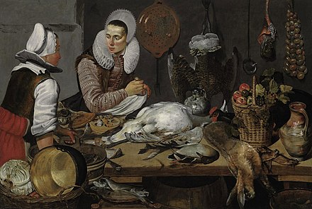 A kitchen interior with a maid and a lady preparing game, c. 1600