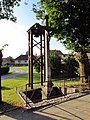 Čeština: Zvonička a kříž v Koutech, okr. Třebíč. English: Belltower and Wayside cross in Kouty, Třebíč District.