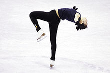 Yu-Na Kim performs a bent-leg layover spin at the 2008 Grand Prix Final. Camel yuna1.jpg