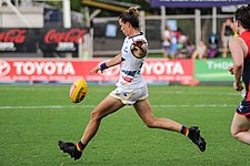Randall kicking during the round 6, 2017 match against Melbourne. Chelsea Randall kicking.1.jpg