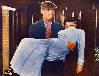 Colored publicity shot featuring John Dierkes and Molly McCard.