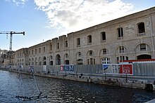 The British Building, renamed as Sadeen Building, in Cospicua being restored to house the AUM in November 2016 Dock no. 1.jpg