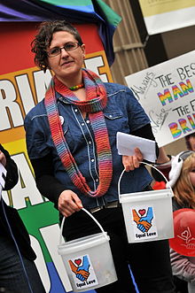 Equal Love convenor Ali Hogg at the August 2011 rally in Melbourne Equal Love Convenor Ali Hogg at the August 2011 Rally in Melbourne holding fund-raising buckets.JPG