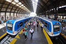 CSR trains operated by Trenes Argentinos at Retiro railway station. Ferrocarril Mitre EMUs at Retiro.jpg