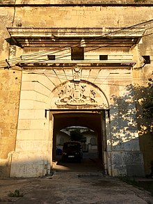 Fort Verdala main gate, with British insignia Fort Verdala entrance gate, June 2018 (1).jpg