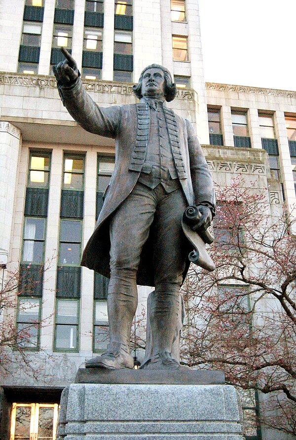 A statue of George Vancouver in front of Vancouver City Hall