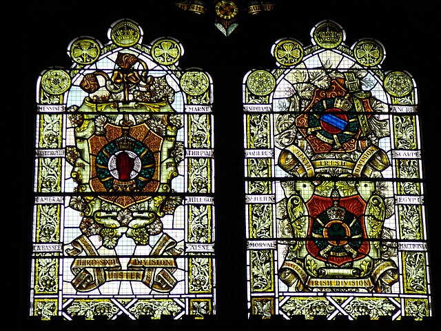 Guildhall Derry stained-glass window which commemorates the Three Irish Divisions, left the 36th, right the 10th and 16th