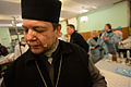 Greek catholic priest seen in in a makeshift hospital during clashes in Kyiv, Ukraine. Events of February 18, 2014